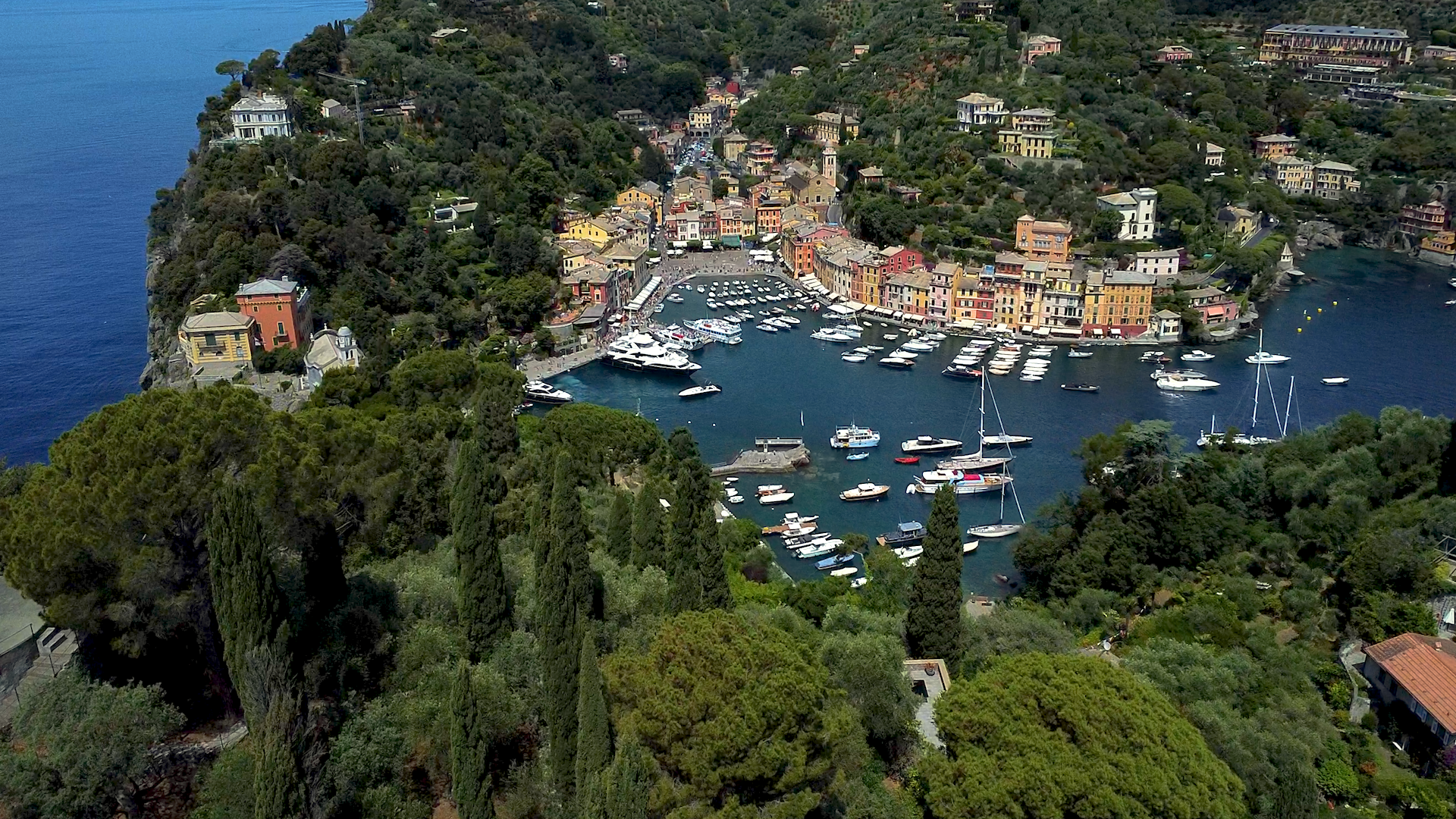 Boat cruising the Ligurian coast
